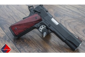 Full-size Government 1911 pistol from Fusion Firearms with a 5 inch barrel and red grips, the largest of the three classic 1911 size classes