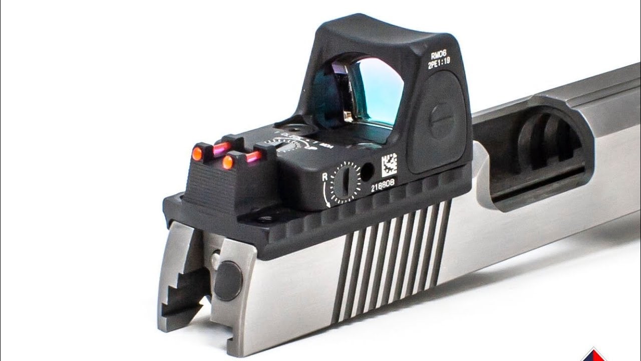 Fusion Firearms stainless 1911 slide milled for an RMR-style red dot, optic mounted flush with backup fiber-optic front sight