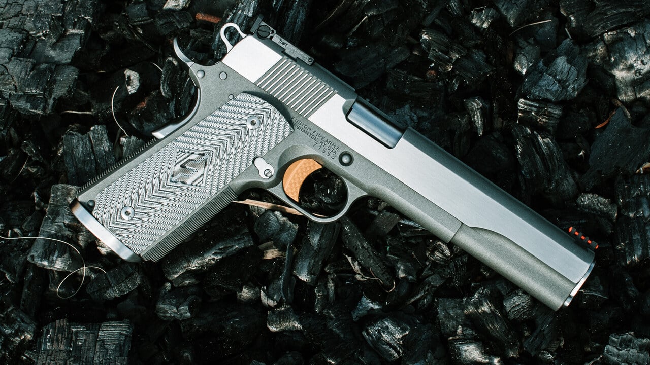Custom Fusion Firearms 6 inch Ash Viper Gold Pro long-slide 1911 pistol chambered in .357 SIG, stainless steel with gray G10 grips