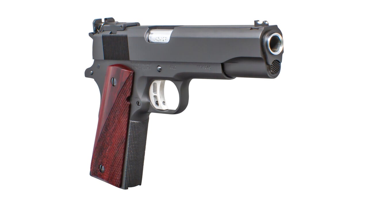 Custom Fusion Firearms full-size 1911 pistol with rosewood grips, chambered in .45 ACP, the cartridge the 1911 was designed around